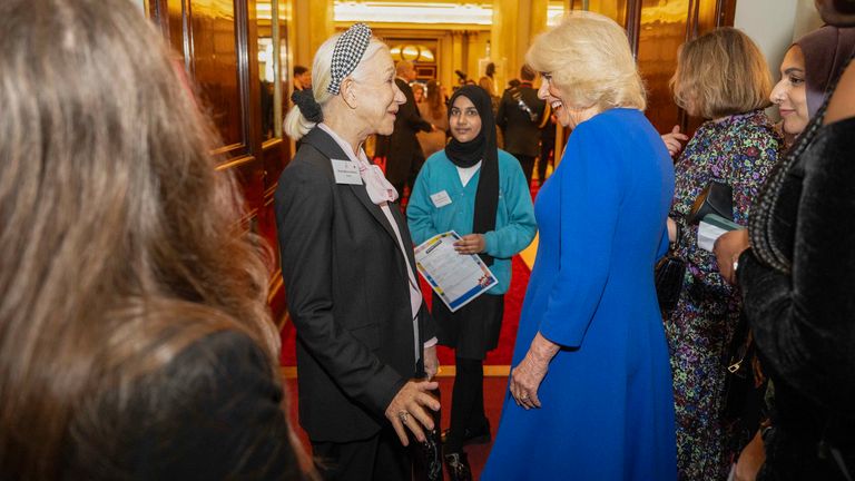 Queen Camilla, President of the World Organization for Women (WOW), talks to Dame Helen Mirren (left) at a reception held at Buckingham Palace in London to celebrate International Women's Day and mark the end of the WOW Girls' Day bus tour. Image date: Tuesday, March 12, 2024.  PA photo. See PA story Royal Camilla. Photo credit should read: Paul Grover/The Telegraph/PA Wire                                                                                                                                                                                                                                                                                                                                                                                                                                                                                                                                                                                                                                           