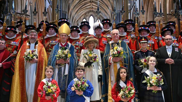 Queen Camilla  poses for a photograph with the Maundy party during the Royal Maundy service at Worcester Cathedral. Picture date: Thursday March 28, 2024.
