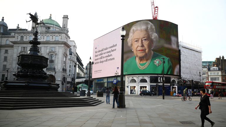 Queen Elizabeth's coronavirus message on a billboard at Piccadilly Circus. Pic: Reuters