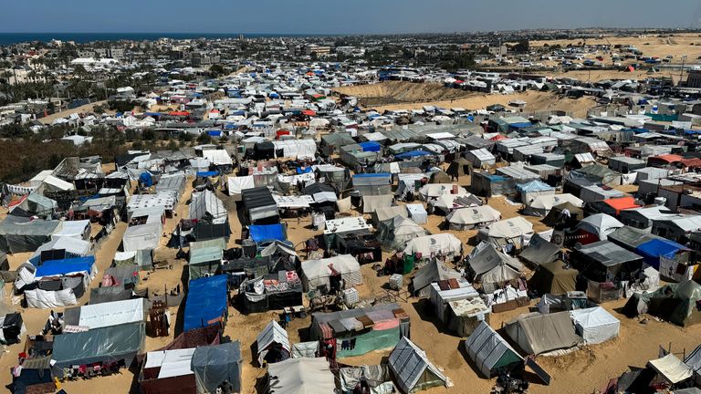 FILE PHOTO: Displaced Palestinians, who fled their houses due to Israeli strikes, shelter in a tent camp, amid the ongoing conflict between Israel and the Palestinian Islamist group Hamas, in Rafah, in the southern Gaza Strip March 11, 2024. REUTERS/ Bassam Masoud/File Photo
