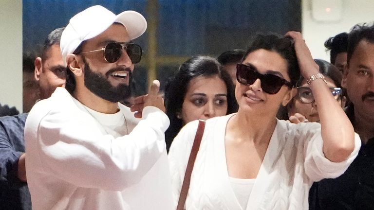 Bollywood actors Ranveer Singh and Deepika Padukone arrive at airport to attend the pre-wedding celebrations of Anant Ambani . Pic: AP Photo/Ajit Solanki