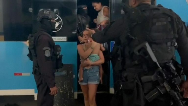 Brazil: Police free hostages held at gunpoint inside bus for three hours | World News | Sky News