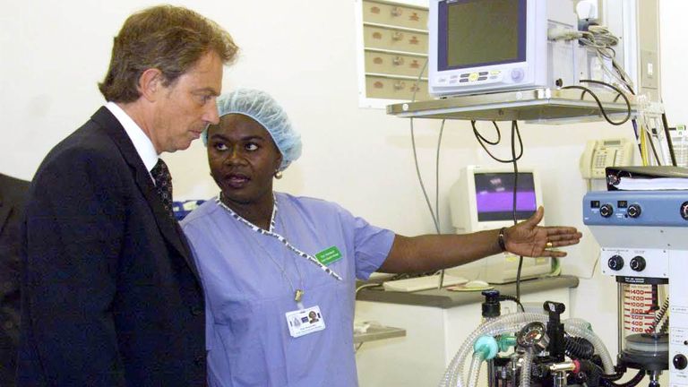 Rose Amankwaah meets then prime minister Tony Blair while working as a staff nurse. Pic: PA