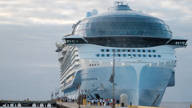 Tourists leave the Royal Caribbean&#39;s Icon of the Seas, the largest cruise ship in the world, after arriving at Costa Maya Cruise Port, in the village town of Mahahual, Quintana Roo state, Mexico