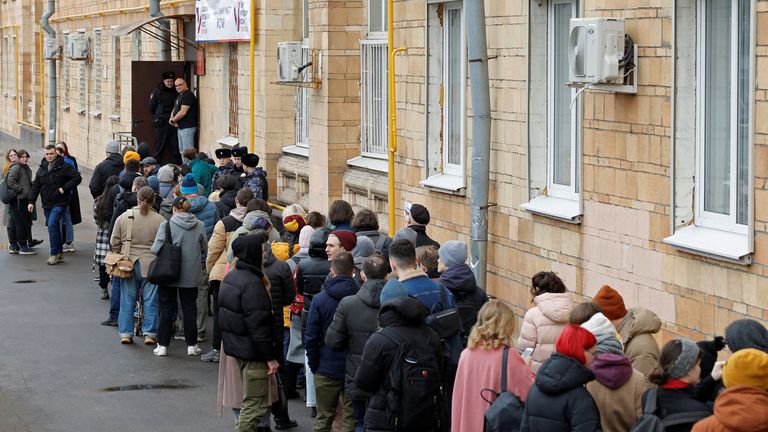 People stand in a line to enter a polling station around noon on the final day of the presidential election in Moscow, Russia, March 17, 2024. Yulia Navalnaya, widow of opposition leader Alexei Navalny, called on Russians to join an election day protest at noon on March 17 to vote against President Vladimir Putin or spoil their ballots. REUTERS/Maxim Shemetov
