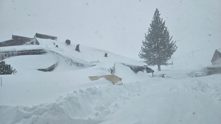 A house is covered with snow, in Truckee, U.S., in this picture obtained from social media, March 2, 2024 . Ashley Belline/via REUTERS THIS IMAGE HAS BEEN SUPPLIED BY A THIRD PARTY. MANDATORY CREDIT. NO RESALES. NO ARCHIVES.