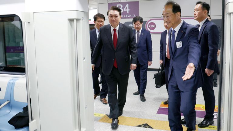 South Korean President Yoon Suk Yeol gets on a train after an opening ceremony of GTX-A in Seoul, South Korea, March 29, 2024. Yonhap via REUTERS THIS IMAGE HAS BEEN SUPPLIED BY A THIRD PARTY. NO RESALES. NO ARCHIVES. SOUTH KOREA OUT. NO COMMERCIAL OR EDITORIAL SALES IN SOUTH KOREA.
