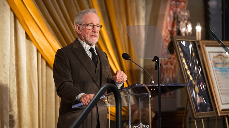 Pic: USC/Sean Dube/PA
Undated handout photo issued by the University of Southern California of Steven Spielberg speaking during a ceremony which honoured the USC Shoah Foundation, receiving the University of Southern California (USC) Medallion – its highest honour. Spielberg founded the USC Shoah Foundation, which gives Holocaust survivors and witnesses the opportunity to preserve their testimonies, in 1994 following the release of his Oscar-winning film Schindler’s List. Issue date: Tuesday Mar