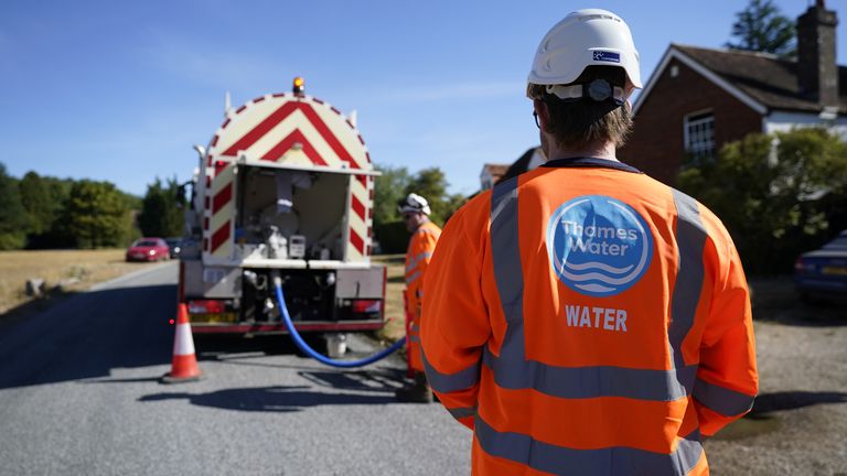File photo dated 10/08/22 of workers from Thames Water delivering a temporary water supply from a tanker, as ministers have continued efforts to reassure Thames Water customers that their supplies would not be affected as a result of the financial troubles faced by the firm.