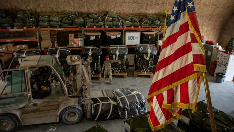 US Air Force members work on the preparation of a humanitarian aid drop for Gaza residents. Pic: US Central Command/Reuters