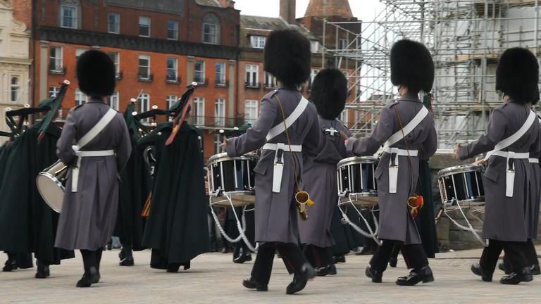 At Windsor this morning, crowds lined the streets to watch the Irish Guards pipe and drum their way into the castle grounds to change duties with the Welsh guards.