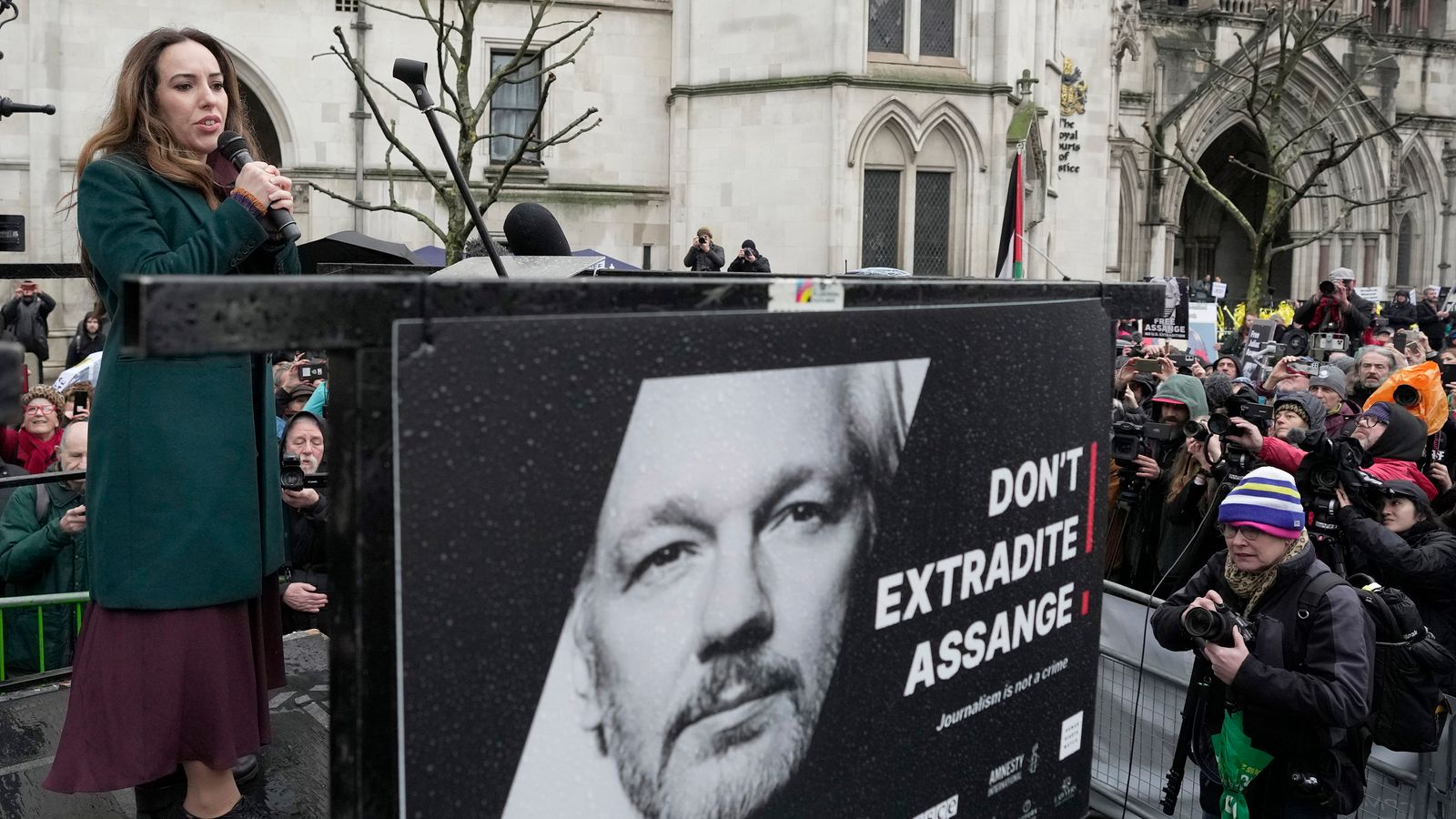 Julian Assange's wife calls on Biden to 'do right thing' as supporters mark five years since he was taken to prison