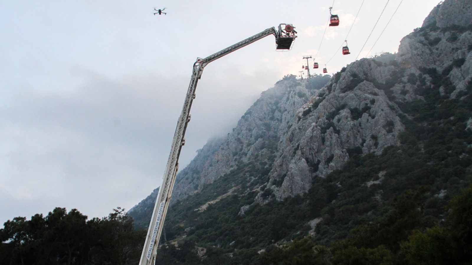Cable car collision leaves one dead, 10 injured and hundreds stranded mid-air in Turkey