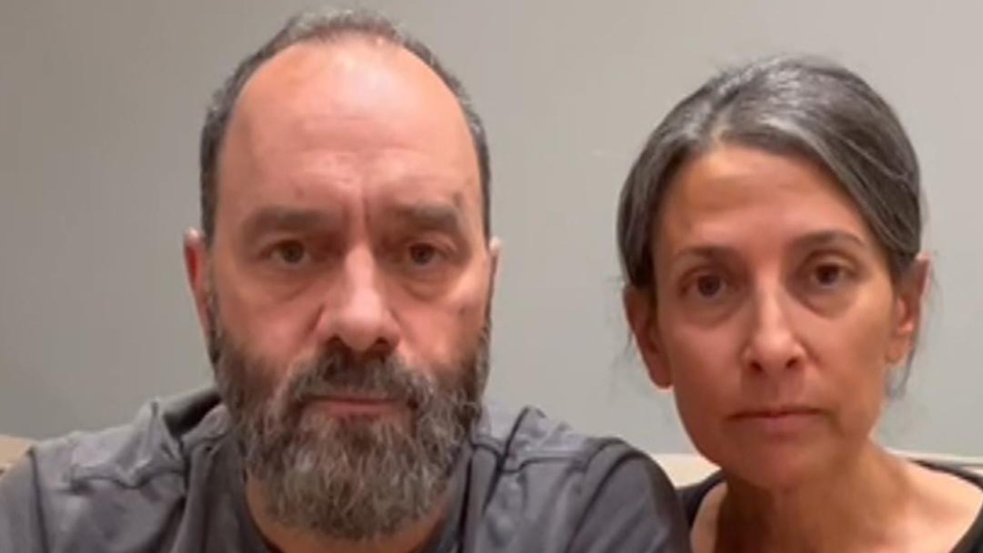 Hostage's parents tell him to 'stay strong' after video shows him missing part of arm