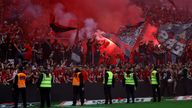 Bayer Leverkusen fans let off flares. Pic: Reuters 