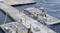 Construction off a floating pier in the Mediterranean Sea off the Gaza Strip.
Pic: U.S. military&#39;s Central Command/AP