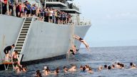 HMS Portland took a break from routine on the 20th April 2010 to allow the ships company a hands to bathe which is where they jump off of the side of the ship for a swim in the sea.
Pic: LA(Phot) Simpson/Crown Copyright