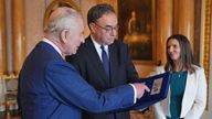 King Charles is presented with the first bank notes featuring his portrait from the Bank of England Governor Andrew Bailey and Sarah John.
Pic: PA