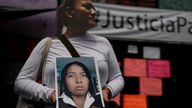Alejandra Jiménez holds an image of Amarirany Roblero who went missing 12 years ago. pic: AP