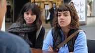 Talia (left) and Simona discuss the crisis