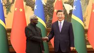 Chinese President Xi Jinping and Solomon Islands Prime Minister Manasseh Sogavare shake hands at the Great Hall of the People in Beijing, China, in July. Pic: Reuters