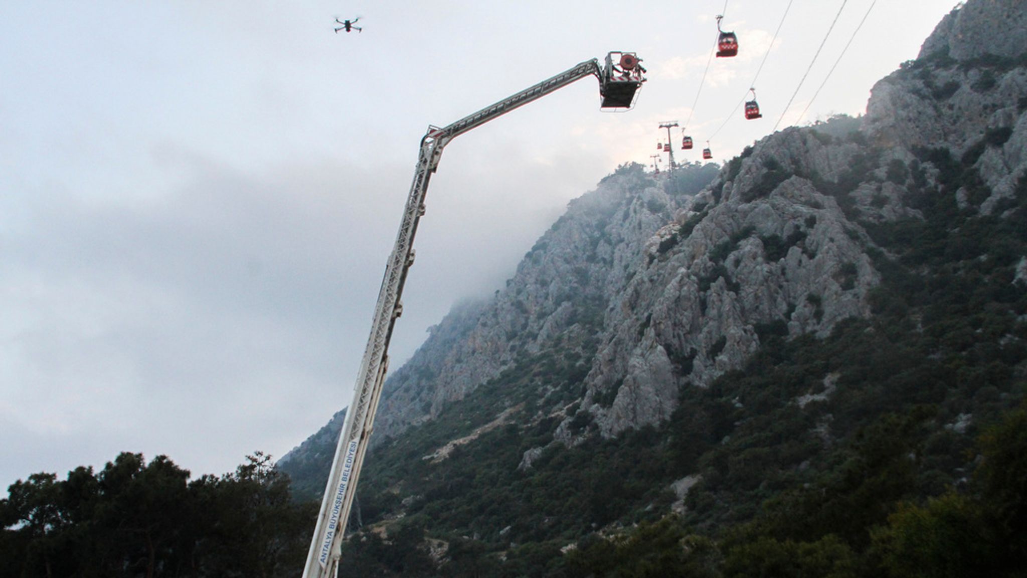 Turkey cable car collision: All 174 people stranded in cable cars above ...