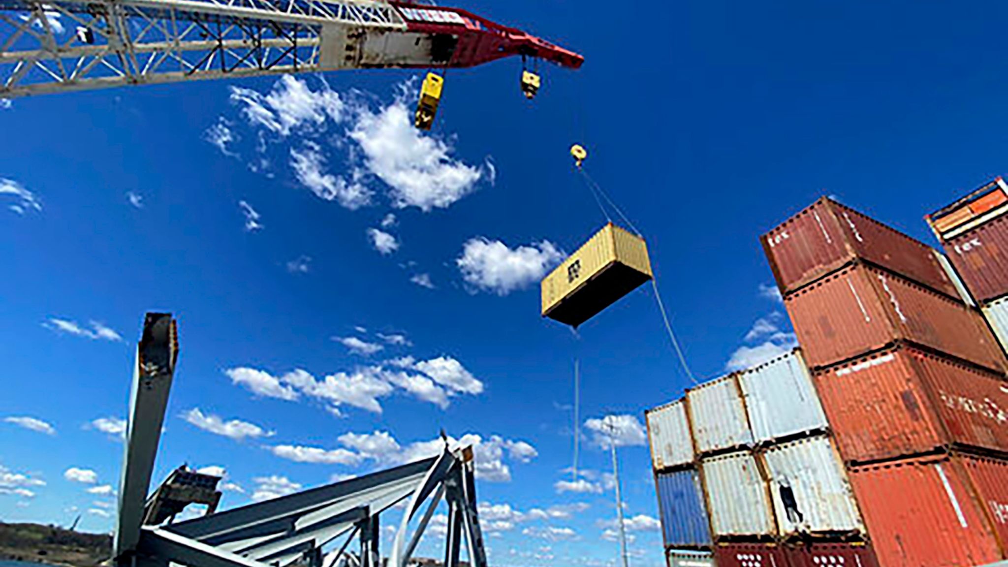 Baltimore bridge salvage crews begin removing containers from cargo ...