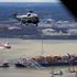 Baltimore bridge salvage crews remove containers from cargo ship