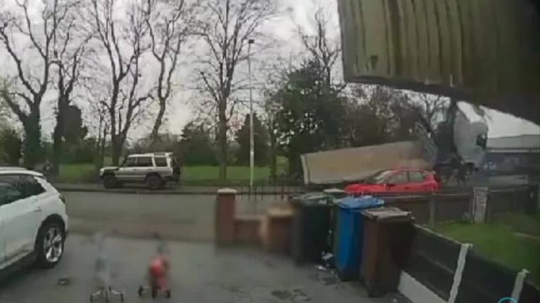Girl avoids falling crane by seconds as it smashes into Wigan house