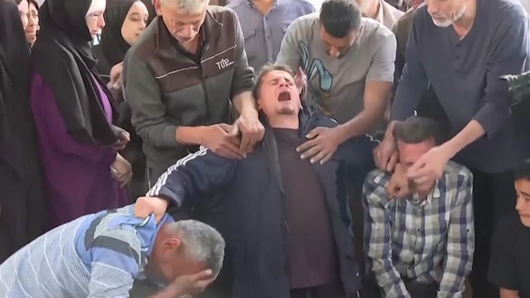 Palestinians mourn nine dead after an Israeli strike on Rafah, Gaza