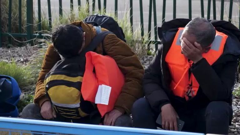 Migrants trying to cross the Channel from France to the UK looked exhausted after being stopped by police. 