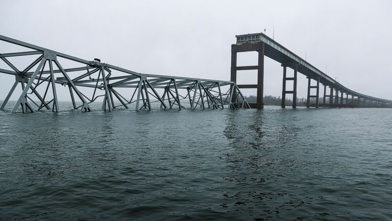 Part of the collapsed Francis Scott Key Bridge stand. Pic: AP