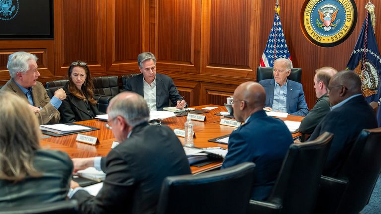 In this image released by the White House, President Joe Biden, third from right, meets with members of the National Security team regarding the unfolding missile attacks on Israel from Iran, Saturday, April 13, 2024, in the Situation Room of the White House in Washington. (Adam Schultz/The White House via AP)