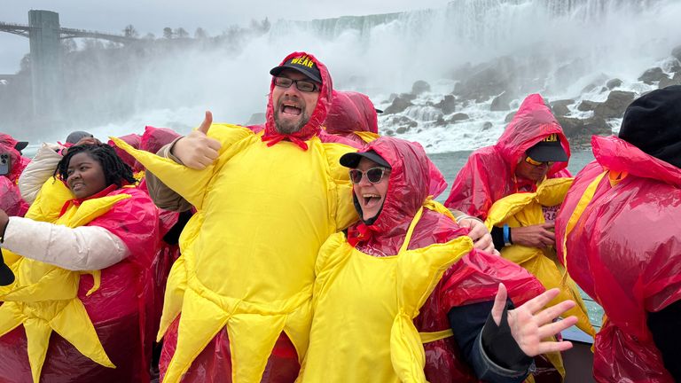 Some of the 309 people gathered to break the Guinness World Record for the largest group of people dressed as the sun in Niagara Falls, Ontario, Canada