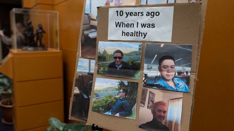 Images of Cheng "Charlie" Saephan are displayed during a news conference where it was revealed that he was one of the winners of the $1.3 billion Powerball jackpot at the Oregon Lottery headquarters on Monday, April 29, 2024, in Salem, Ore. (AP Photo/Jenny Kane)