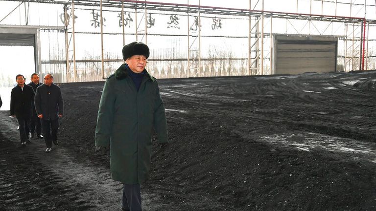 In this photo released by China...s Xinhua News Agency, Chinese President Xi Jinping visits a coal yard of a company that has made efforts to improve the environmental impact of its use of coal in northwestern China...s Shanxi Province, Thursday, Jan. 27, 2022. According to Chinese state media, Xi was paying a visit to the province ahead of the upcoming Lunar New Year holiday. Pic: AP