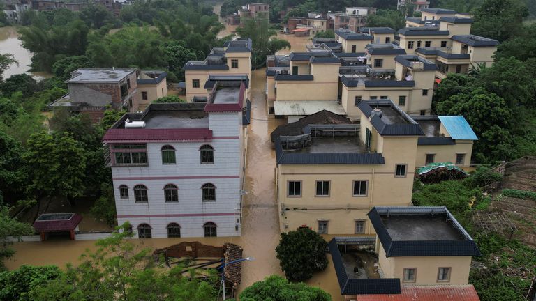 Pic: Reuters
Drone view shows residents rowing a boat as houses are submerged in floodwaters following heavy rainfall, at a village in Qingyuan, Guangdong province, China April 22, 2024. REUTERS/Tingshu Wang