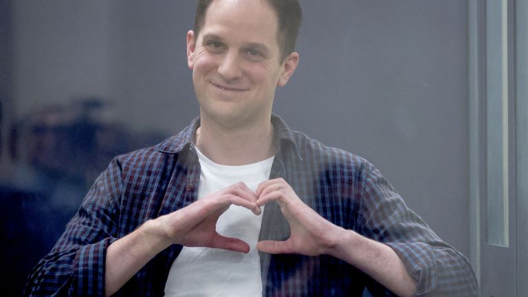 Wall Street Journal reporter Evan Gershkovich makes a heart-shaped gesture as he appears in court.
Pic Reuters