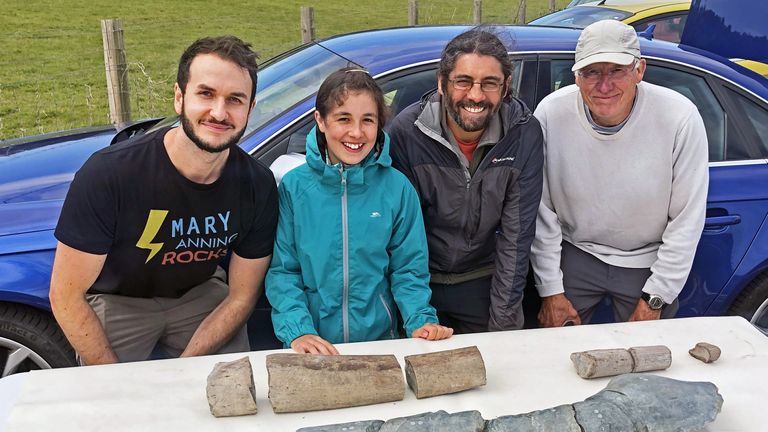 EMBARGOED TO 19:00 WEDNESDAY APRIL 17 Undated handout photo issued by the University of Manchester of (left to right) Dr Dean Lomax, Ruby Reynolds, Justin Reynolds and Paul de la Salle as palaeontologists have identified what may be the largest known marine reptile. Justin and Ruby Reynolds found the fossilised remains of a gigantic jawbone measuring more than two metres long on a beach in Somerset, belonging to the jaws of a new species of enormous ichthyosaur, a type of prehistoric marine rept