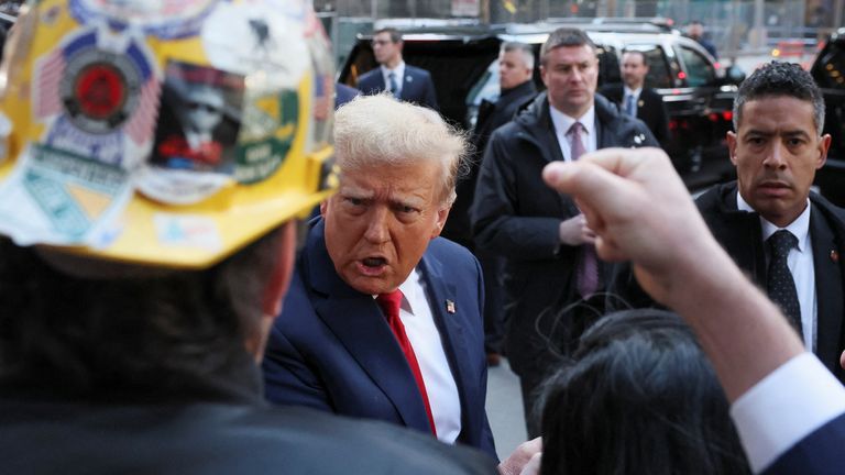Donald Trump speaks to the media on the day he meets with union workers in New York City.  Photo Reuters