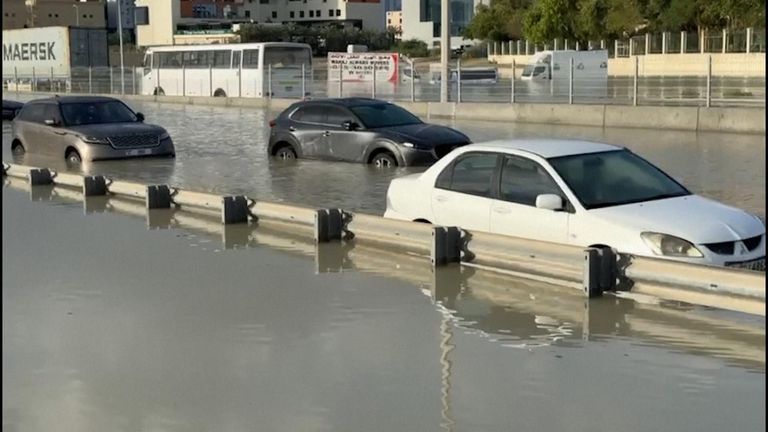Storm dumps heaviest rain ever recorded in desert nation of UAE, flooding roads and Dubai&#39;s airport
