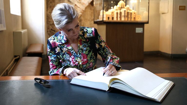 The Duchess of Edinburgh signs the guest book at the Saint Sophia Cathedral in Kyiv. Pic: PA