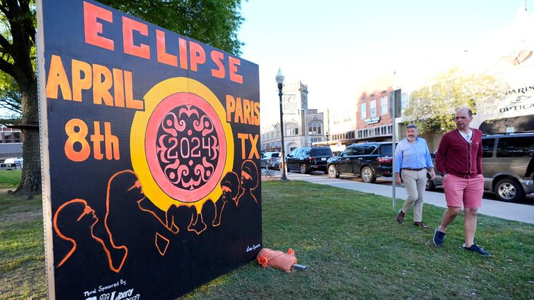 A sign for the eclipse in Paris, Texas, but cloud in the state is set to make viewing tricky. Pic: AP  