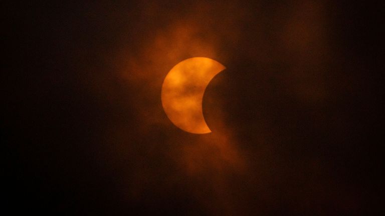 The moon moves in front of the sun during a total eclipse at Eagle Pass Student Activities Center, Monday, April 8, 2024, in Eagle Pass, Texas. (Jon Shapley/Houston Chronicle via AP)