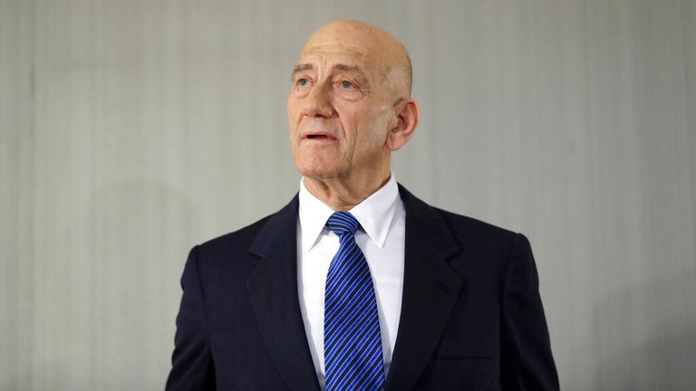 Former Israeli Prime Minister Ehud Olmert takes questions from reporters after a news conference in New York, Tuesday, Feb. 11, 2020. (AP Photo/Seth Wenig)


