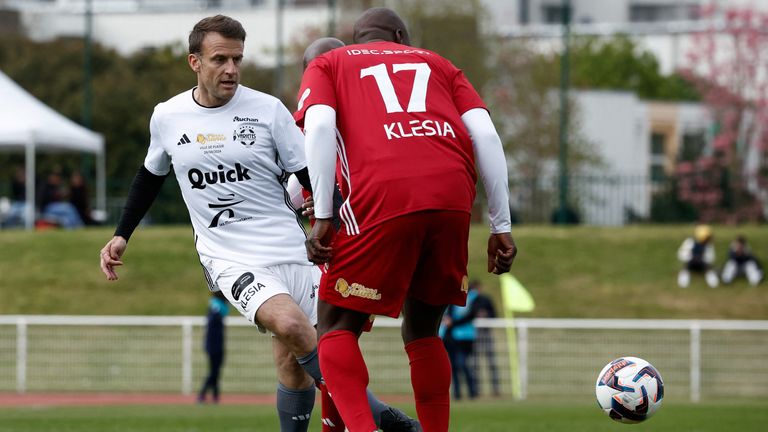 Emmanuel Macron participates in the Varietes Club charity football match to benefit children in hospital.
Pic: Reuters