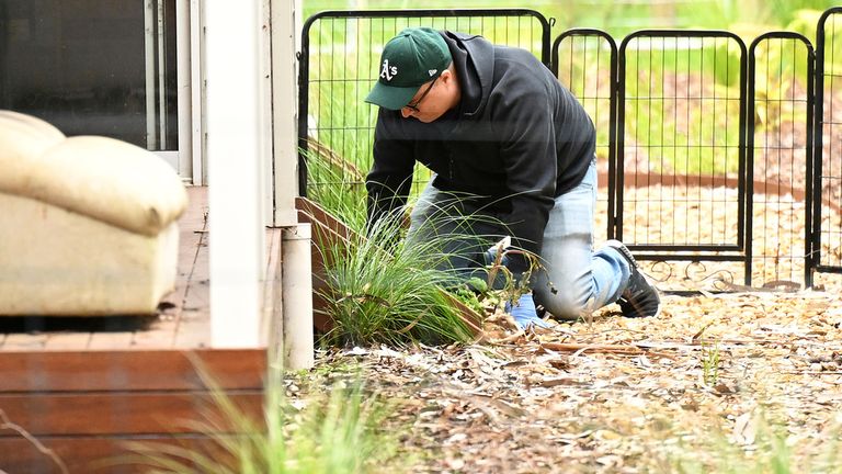 Detectives are seen searching Erin Patterson&#39;s property in November last year. Pic: AP