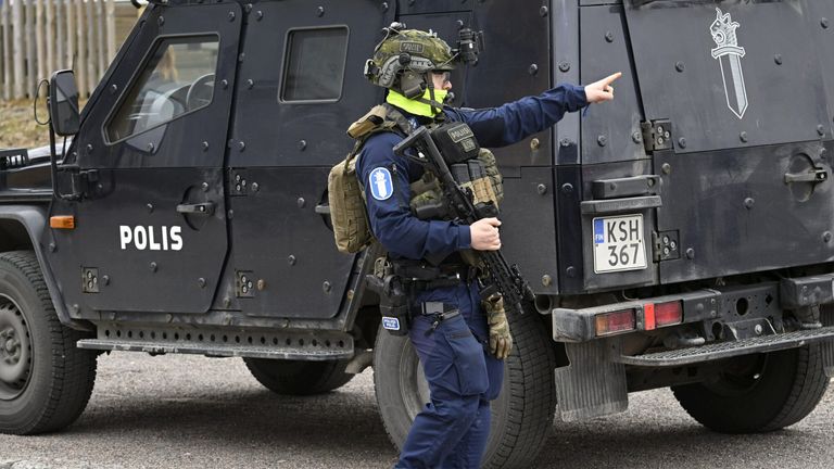 Pic: Markku Ulander/Shutterstock
Vantaa school shooting, Finland - 02 Apr 2024
A police officer gestures at the Viertola comprehensive school in Vantaa, Finland, on April 2, 2024. Three minors were injured in a shooting at the school on Tuesday morning. A suspect, also a minor, has been apprehended.

2 Apr 2024