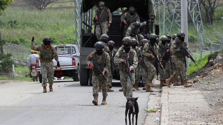 Members of the Security Forces check an area near the Zonal 8 prison, from where Jose Adolfo Macias alias "Fito" disappeared earlier in the month, amid the ongoing wave of violence around the nation, in Guayaquil, Ecuador, January 15, 2024. REUTERS/Henry Romero
