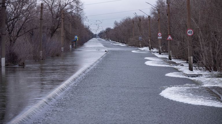 After part of a damn burst nearby, flood water covers much of a highway connecting lower and upper parts of Orsk. Pic: AP